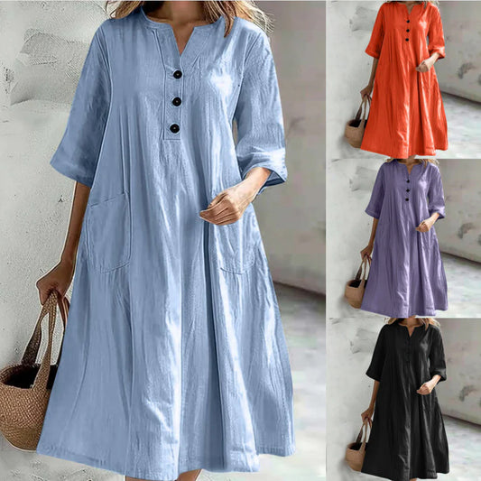 Mid-length V-neck half-sleeve cotton and linen loose version three-button pocket dress